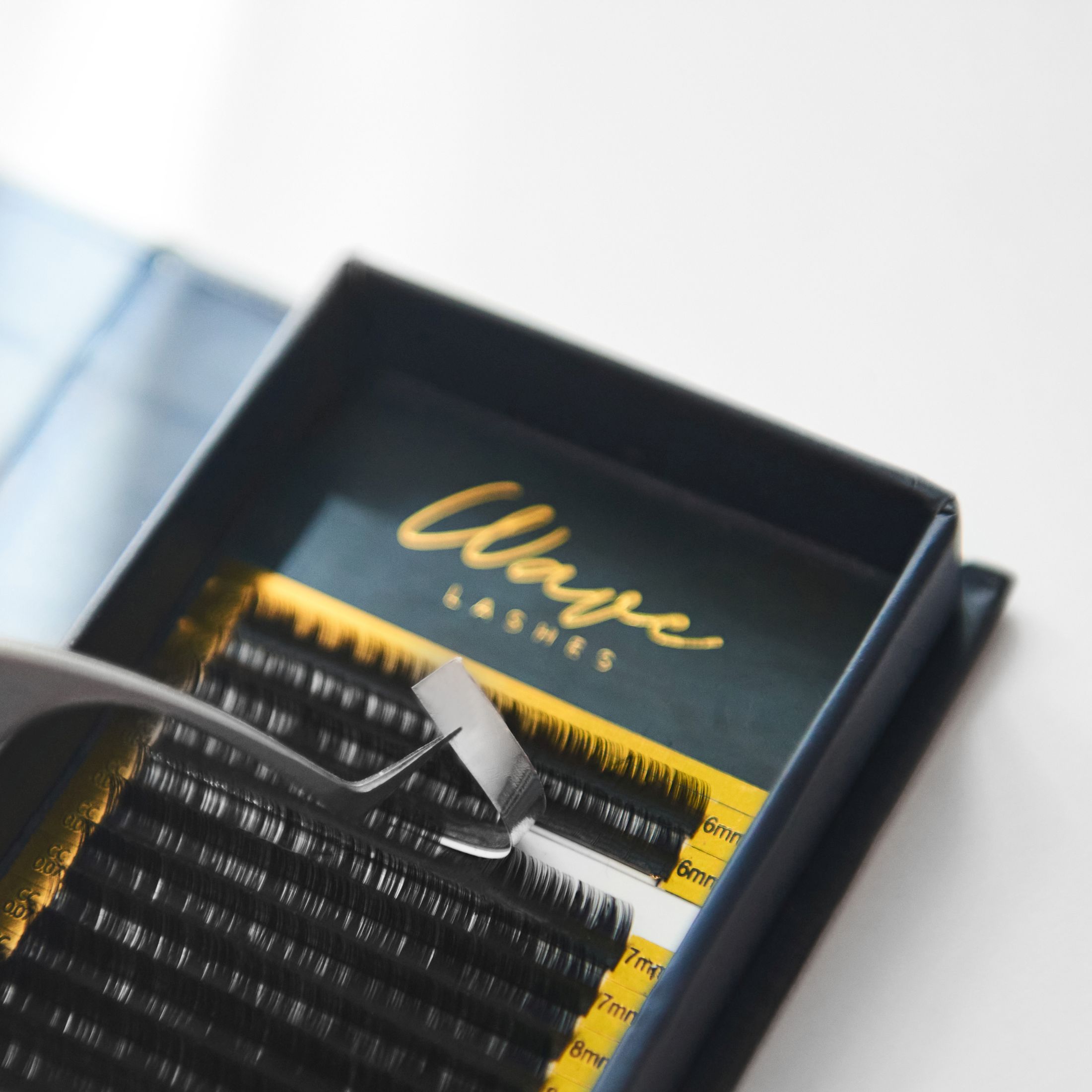 WAVE lashes with foil-backed Clean Peel strips WAVE lashes with foil-backed Clean Peel strips
