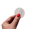 Self-adhesive base for glue drops