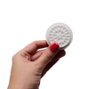 Self-adhesive base for glue drops